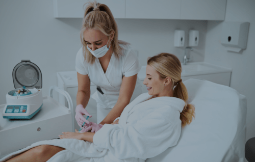 concentrated-doctor-giving-a-platelet-rich-plasma-2021-09-03-09-42-27-utc-1-e1683893693795-min