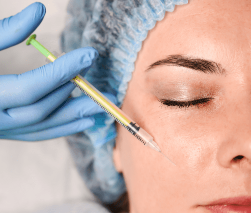 young-woman-getting-beauty-injection-at-wellness-c-2022-05-30-21-51-07-utc-1-1-e1685097760199-min